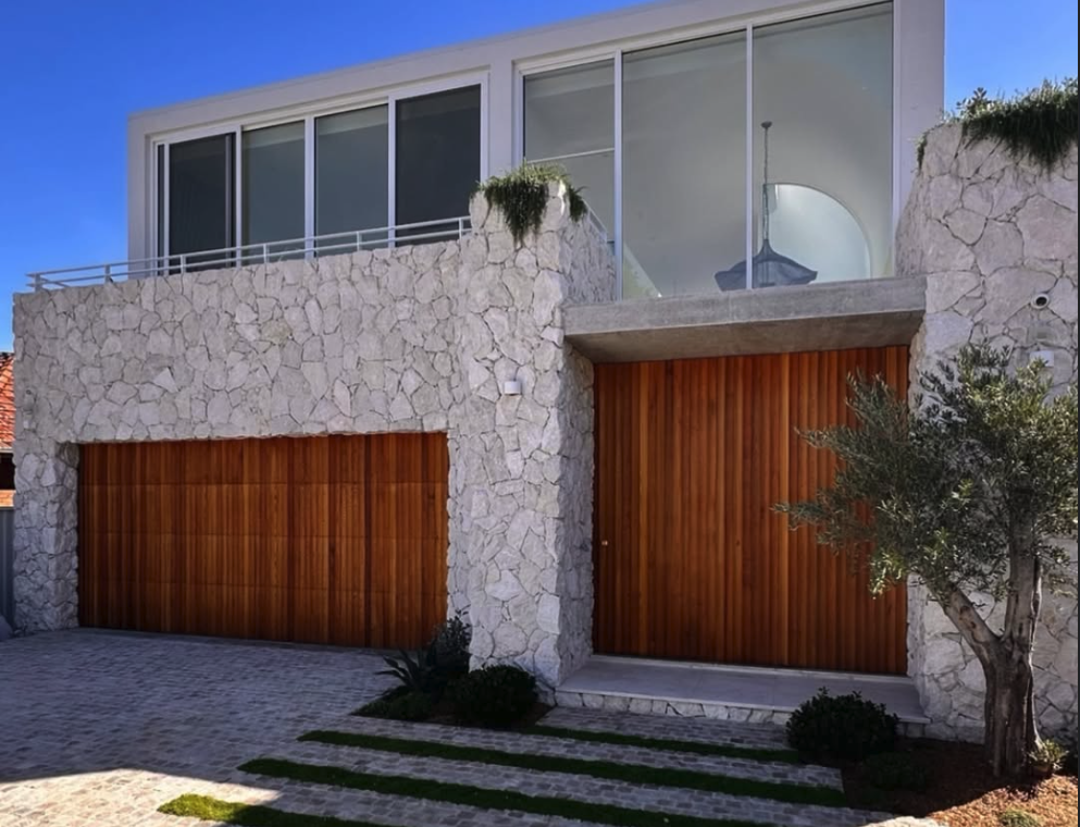 Traditional wood cladding on modern frame